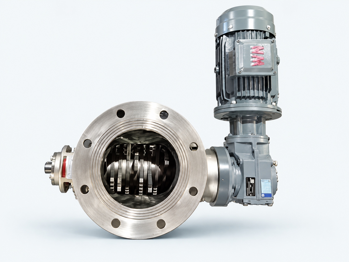 Electric crushing valve flange with visible internal crushing blades and motor drive